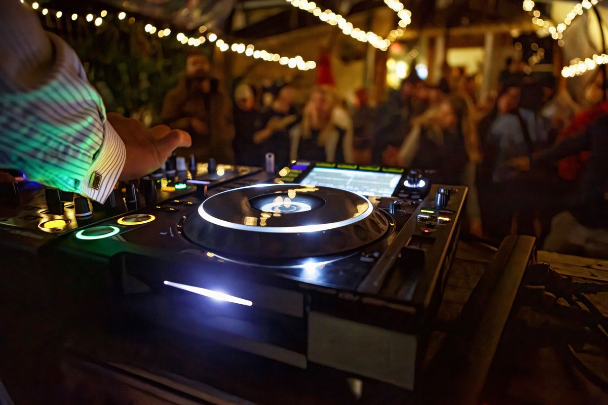 DJ mixing at a Parked Up event